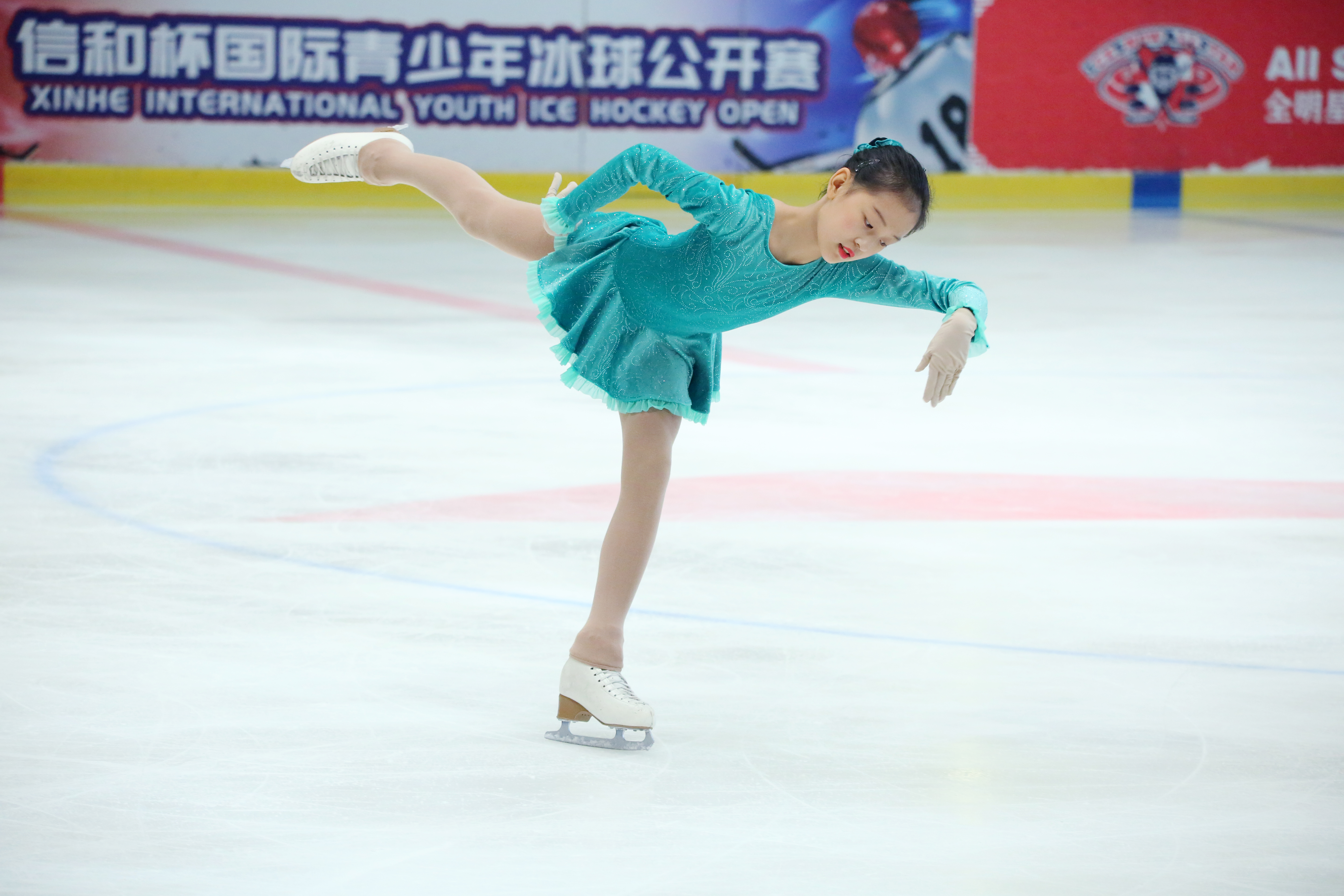 Figure skater holding an elegant spiral position